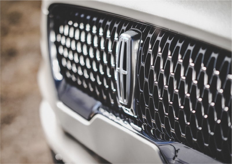 The grille of the 2023 Lincoln Aviator® Reserve model with an eye-catching repeated field of Lincoln Star logo shapes | Dan Cummins Lincoln in Nicholasville KY