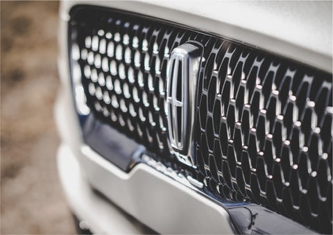 The grille of the 2023 Lincoln Aviator® Reserve model with an eye-catching repeated field of Lincoln Star logo shapes | Dan Cummins Lincoln in Nicholasville KY
