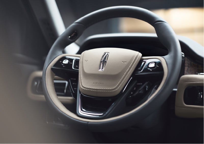 The intuitively placed controls of the steering wheel on a 2023 Lincoln Aviator® SUV | Dan Cummins Lincoln in Nicholasville KY