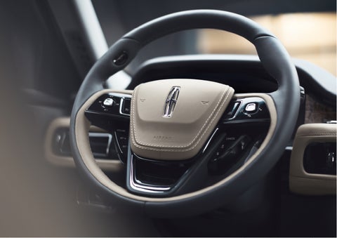 The intuitively placed controls of the steering wheel on a 2023 Lincoln Aviator® SUV | Dan Cummins Lincoln in Nicholasville KY