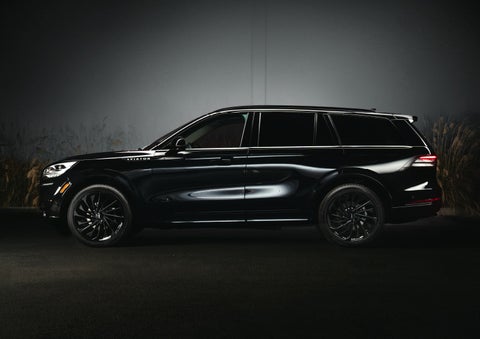 A 2024 Lincoln Aviator® SUV is shown in the Infinite Black exterior color | Dan Cummins Lincoln in Nicholasville KY