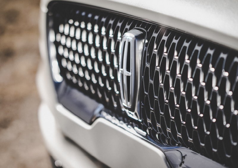 The grille of the 2024 Lincoln Aviator® Reserve model with an eye-catching repeated field of Lincoln Star logo shapes | Dan Cummins Lincoln in Nicholasville KY