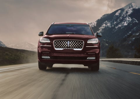 A 2024 Lincoln Aviator® SUV is shown in the Diamond Red exterior color. | Dan Cummins Lincoln in Nicholasville KY