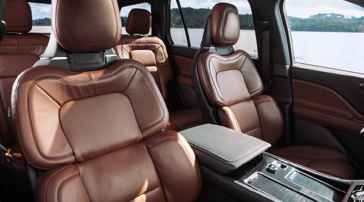The front row's Perfect Position Seats in a 2024 Lincoln Aviator® Reserve model with Ebony Roast interior | Dan Cummins Lincoln in Nicholasville KY