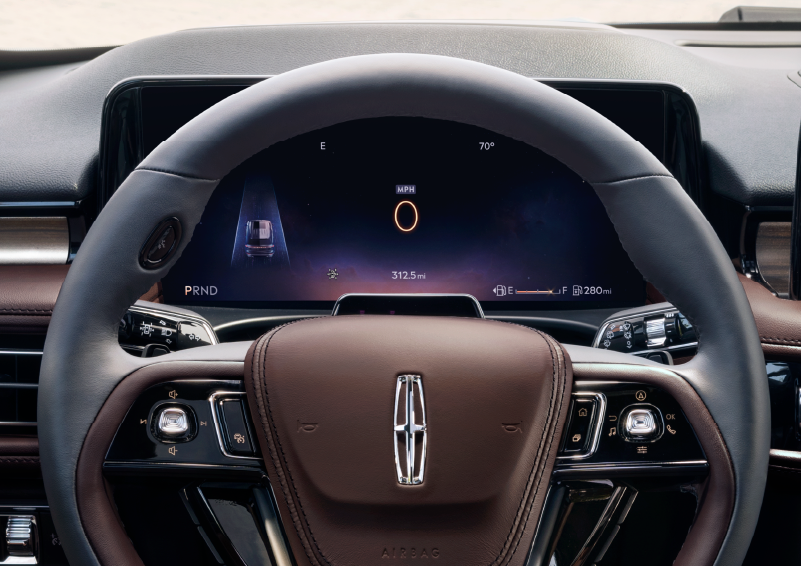The steering wheel of 2025 Lincoln Aviator® SUV is shown with black and brown accents. | Dan Cummins Lincoln in Nicholasville KY