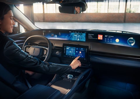 The driver of a 2025 Lincoln Nautilus® SUV interacts with the center touchscreen. | Dan Cummins Lincoln in Nicholasville KY