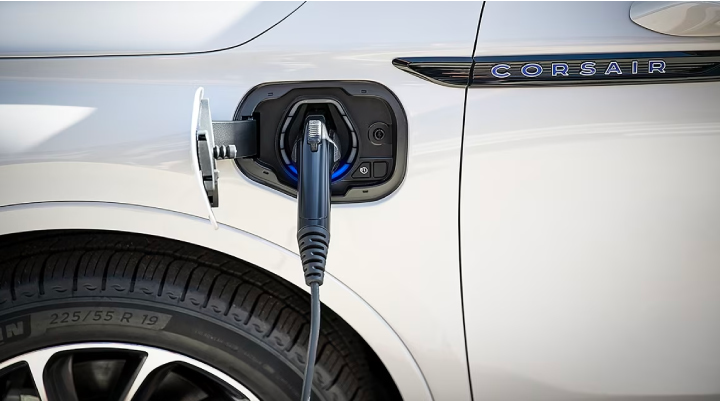 An electric charger is shown plugged into the charging port of a Lincoln Corsair® Grand Touring
model. | Dan Cummins Lincoln in Nicholasville KY