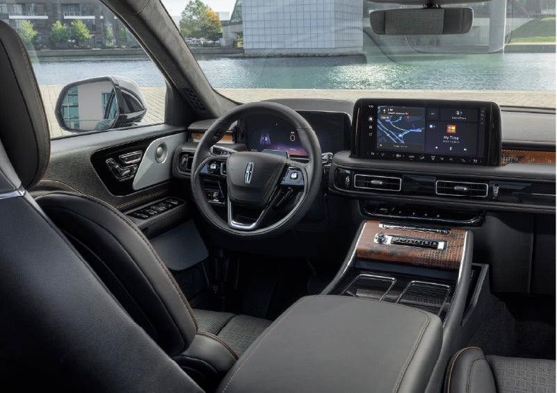 The interior of the 2026 Lincoln Aviator® SUV is shown parked with a view of a harbor through the windshield. | Dan Cummins Lincoln in Nicholasville KY