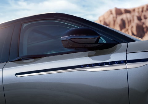 Blue lettering on the side of the vehicle that reads Nautilus indicates the available Hybrid Powertrain. | Dan Cummins Lincoln in Nicholasville KY