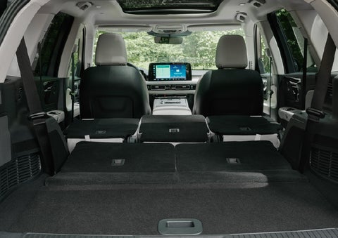A rear to front view of the interior of a 2027 Lincoln Aviator® Black Label™ SUV shows the third and second rows folded flat | Dan Cummins Lincoln in Nicholasville KY